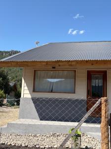 a house with a window at Betsaida2 in Lago Meliquina +1 photo