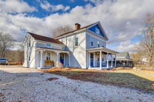 a white house with a blue roof at Walk to Memorial Park: Pet-Friendly Bethlehem Home in Bethlehem