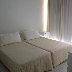Postel nebo postele na pokoji v ubytování Hotel Marko