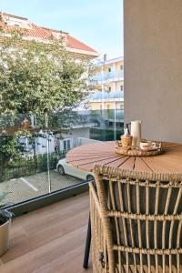 a table with a tray of food on a balcony at A la plage R in San Benedetto del Tronto