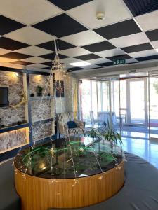 a large room with a large table in the middle at Legend Tem Hotel in Silivri