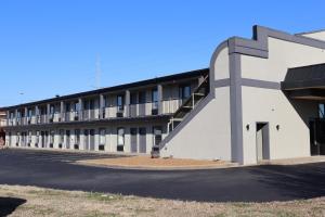 a building with a staircase on the side of it at legacy inn paducah in Paducah