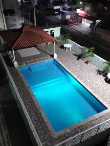 an overhead view of a blue swimming pool at Areito Apartament A&A in Juan López