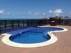 Piscina en o cerca de Apartamento Sol e Mar Maceió