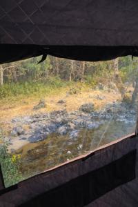 a view of a river from a car window at 川辺の宿-Kawabe-BBQ-川遊び in Hanno +122 photos