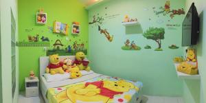 Postel nebo postele na pokoji v ubytování Fantasy Hotel