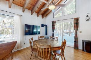 a dining room with a wooden table and chairs at < 2 Mi to Tahoe Donner Ski Resort: Serene Retreat in Armstrong