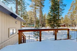 a covered porch with snow on a house at < 2 Mi to Tahoe Donner Ski Resort: Serene Retreat in Armstrong
