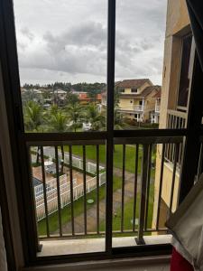a view from a window of a city at Loft reserva do Sahy- condado in Mangaratiba