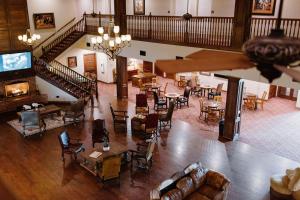 an overhead view of a living room with tables and chairs at Wildcatter Ranch and Resort in Graham