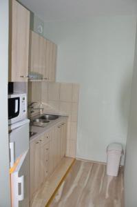 Una cocina o zona de cocina en Apartments Varga