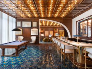 a room with a pool table and a bar at Rixos Tersane Istanbul in Istanbul