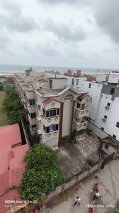 an overhead view of a group of apartment buildings at Seabeach rest and nest in Puri