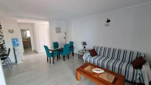 a living room with a couch and a table at a SPECIAL place in Los Cristianos