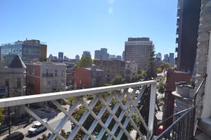 a view of the city from a balcony at Hotel La Residence du Voyageur in Montreal