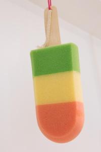 a colorful sock ornament on a white background at The Corner London City in London