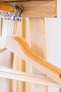 a close up of a wooden staircase with wood treads at The Corner London City in London