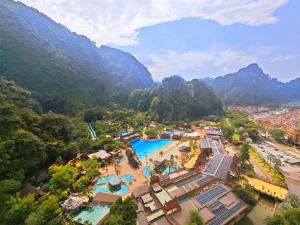 an aerial view of a resort with mountains in the background at Sunway Onsen Suites - Theme Park Tambun Ipoh by Ryokan Management in Tambun