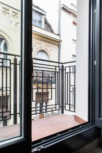 an open window with a view of a building at Luxe Central Apartments in Budapest