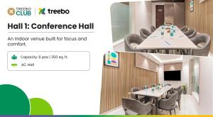 a screenshot of a conference hall with a table and chairs at Treebo Liyan Orchid, Hsr Layout in Bangalore