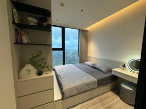 a bedroom with a bed and a large window at AnVy house Skyforest 2 Ecopark in Xuân Quan +44 photos
