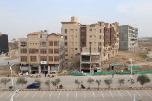 a group of buildings under construction in a city at Bahria Premium Hotel in Rawalpindi