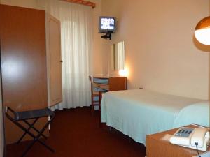 Letto o letti in una camera di Hotel Giardinetto