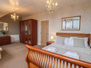 a bedroom with a large bed in a room at Bridlington Bay House in Bridlington
