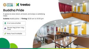 a screenshot of a restaurant with a table and chairs at Treebo Buddha Pride in Patna
