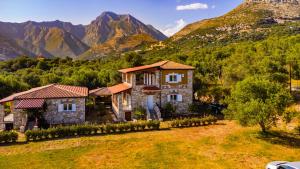 an image of a house in the mountains at Siar The Small Villa by PikHost in Borsh