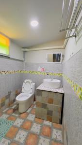 a bathroom with a toilet and a sink at Thung Setthi Homestay&Cafe4 in Chiang Dao +16 photos