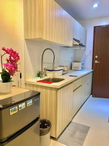 a kitchen with a sink and a counter top at 2B-15 Condo Staycation at Megatower 1 in Baguio