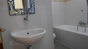 Koupelna v ubytování Arya Homestay
