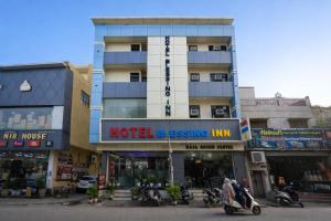 a building with a hotel blessing inn in a city at Hotel Blessing Inn in Jalandhar