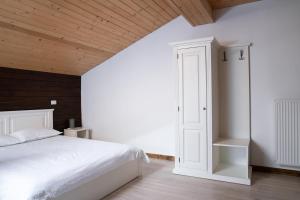 Un pat sau paturi într-o cameră la Hotel Dia Lin