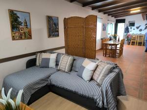 a living room with a couch and a table at Casa Chemar in La Orotava