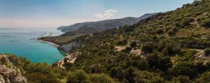 a view of a mountain with a body of water at Bed and Breakfast Brezza Marina 2 in Mattinata