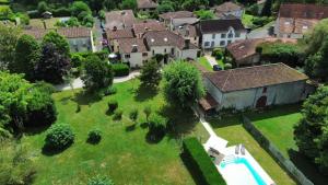 an aerial view of a house with a yard at LE CLOS DU BENESTAR in Mauvezin-dʼArmagnac