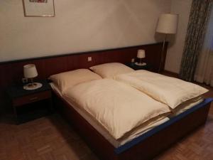 Cama ou camas em um quarto em Hotel Seltenriegel