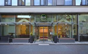 a building with a sign on the front of it at B&B HOTEL Maribor Orel in Maribor