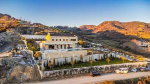 an aerial view of a building on a mountain at Jerina Mansion by PikHost in Tirana