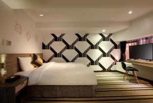 Letto o letti in una camera di RF Hotel - Zhongxiao