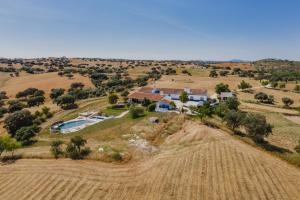 an aerial view of a home in a field at Herdade dos Mestres in Terena