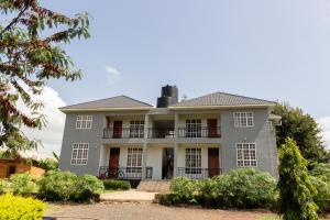 an image of a large house at Kitopua suites in Arusha