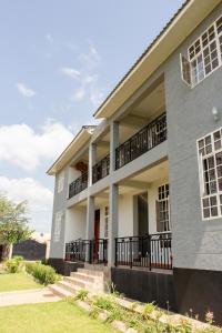 an image of a house at Kitopua suites in Arusha +5 photos