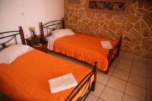Letto o letti in una camera di Pension Stella