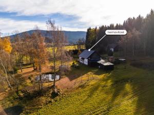 an aerial view of a farm with a house at Chalupa Sibřinka in Korkusova Huť