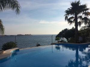 Bazén v ubytování Royal Palm Hotel nebo v jeho okolí