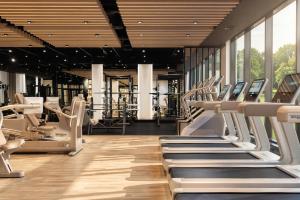 a gym with rows of treadmills at Seamill Hydro Hotel in Seamill