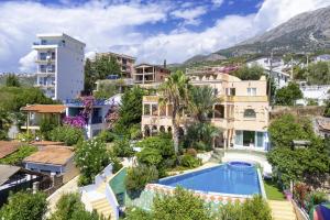an image of a house with a swimming pool at Maroccana in Dobra Voda